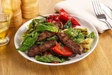 Salad with grilled beef steak
