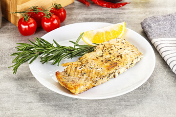Baked salmon fish served rosemary