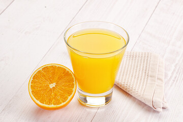 Sweet fresh orange juice in the glass