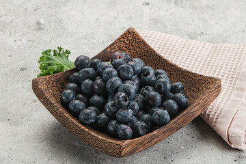 Sweet ripe blueberry on the bowl