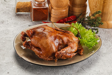 Baked small chicken with spices