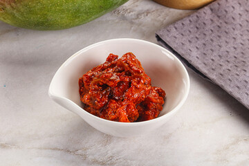 Spicy pickled raw green mango