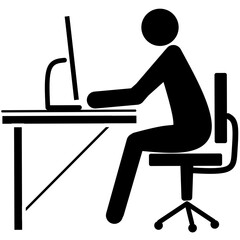 silhouette of a man working on a computer 
