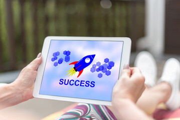 Success concept on a tablet