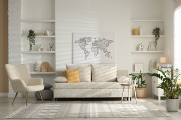 Contemporary furniture, houseplants and decor in light living room. Interior design