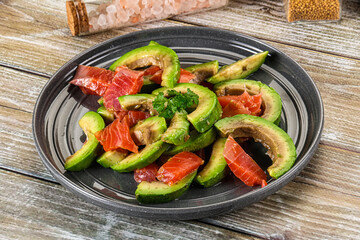 Salad with avocado and salmon