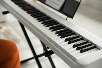 Synthesizer with black and white keys at home, closeup