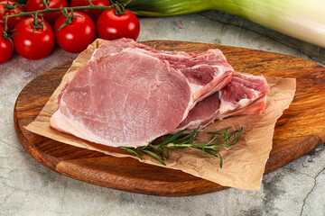 Raw pork steak loin with bone