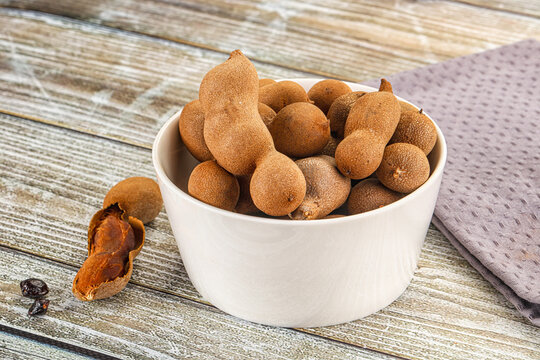 Tropical exotic Tamarind fruit heap