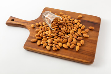 almonds with wooden cutting board