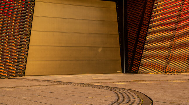 Garage door and entrance to futuristic building