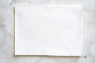 Blank white paper on mottled surface
