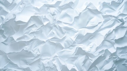 Obraz premium Wrinkled white paper texture with soft shadows. Background for graphic design or creative projects.