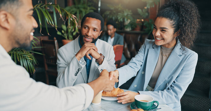 Partnership, handshake and business people in cafe, agreement and b2b deal with contract. Employees, consultant or client in coffee shop, thank you or loan approval with support or startup investment