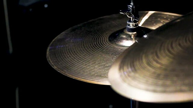 drumming musician close up Musician hands with drumsticks hi hats beating drums playing drums