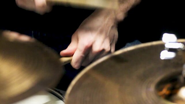 drumming musician close up Musician hands with drumsticks beating drums playing drums
