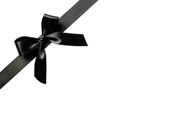Simple black satin elegant ribbon and bow isolated on transparent or white background, mounrning, funeral, grief, condolences, png