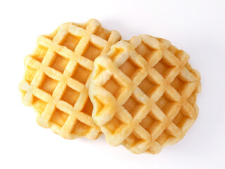 Two round waffles isolated on white background