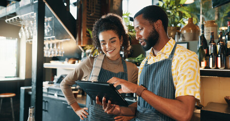 Restaurant, waiter and people on tablet for training for inventory, menu items and checklist by...