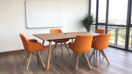 Modern conference room with orange chairs, large table, and bright windows overlooking nature