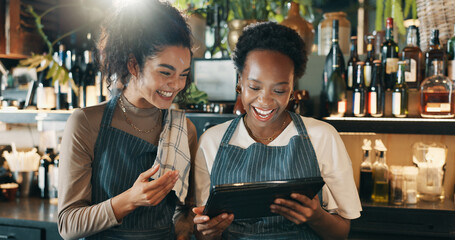 Restaurant, waitress and women on tablet for online inventory, menu items and checklist by bar....