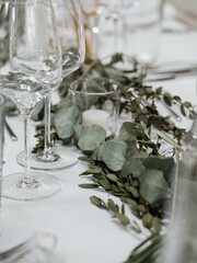 Elegant Table Setting with Eucalyptus