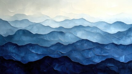 Serene blue mountain landscape with layered peaks under a soft sky, evoking tranquility and depth