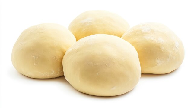 Four balls of unbaked dough, isolated on white background.