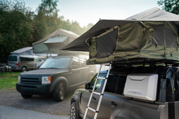 Roof of the car with canoe and touristic tent