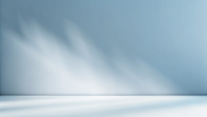 Minimalistic simple background for product presentation. Shadow and light on blue wall.