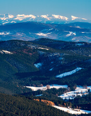 Obraz premium Krivan in High Tatras and Western Tatras mountains from Lysa hora hill in winter Moravskoslezske Beskydy mountains in Czech republic