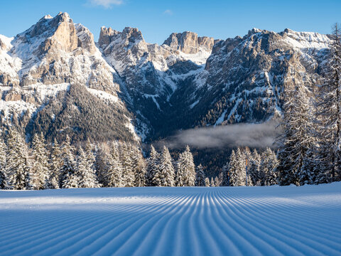 Skiing on the Dolomites Civetta resort On a beautiful sunny day. Italy