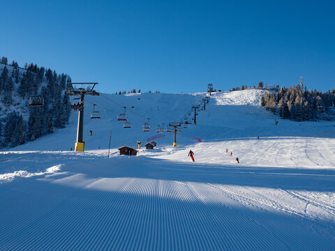 Skiing on the Dolomites Civetta resort On a beautiful sunny day. Italy