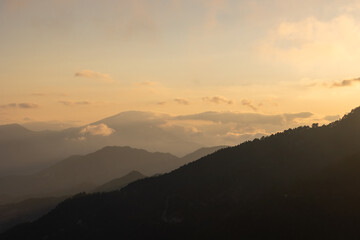 Obraz premium Mountain range view at sunset. Mountain range landscape