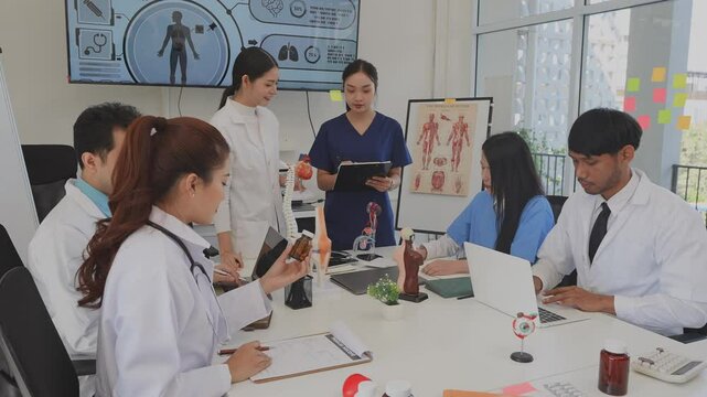 Asian medical team meeting About rickets and human internal organs, medical health concept