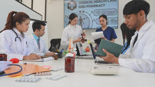 Asian medical team meeting About rickets and human internal organs, medical health concept