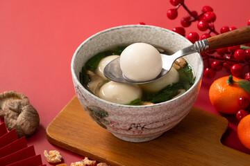 Big tangyuan, yuanxiao with savory soup for traditional lunar festival.