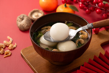 Big tangyuan, yuanxiao with savory soup for traditional lunar festival.
