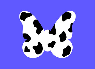 Abstract butterfly symbol with cow pattern on blue background. Dalmatian print shape in black and white colors. Modern illustration.