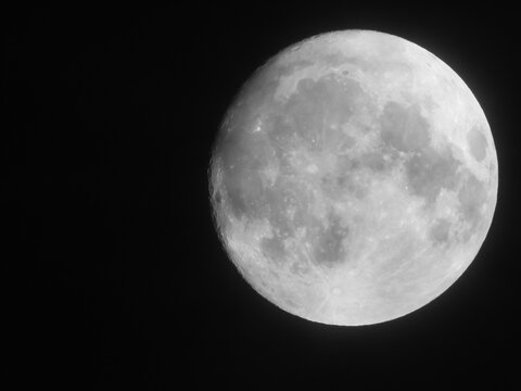 full moon over black sky