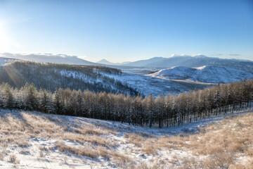 長野県　早朝の霧ケ峰から望む富士山と雪景色
