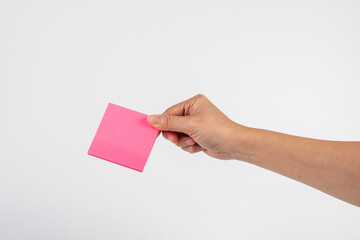Obraz premium Paper stickers in hand. Hand holding a green sticker. Notes for the message.