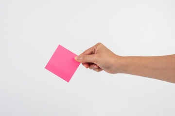 Obraz premium Paper stickers in hand. Hand holding a green sticker. Notes for the message.