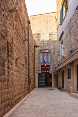 Obraz premium Dubrovnik streets, entrance to the city aquarium. Vertical photo