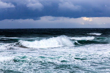 waves crashing on the rocks