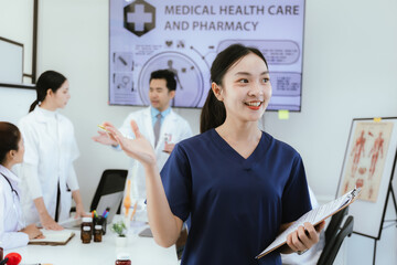 A team of physicians and medical specialists work together in a hospital to discuss patient care and treatment plans. They demonstrate teamwork, expertise, and dedication to health care.