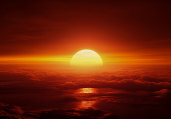 Sunset glow over distant ocean dark red sky, setting sun and horizon clouds at sea level.
