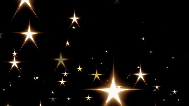 A video still of glowing stars scattered across a black background, captured from a straight-on angle, creating a dreamy, celestial atmosphere.