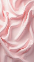 Obraz premium Elegant Pink Silk Fabric Draping Softly Over a Smooth Surface in Artistic Display