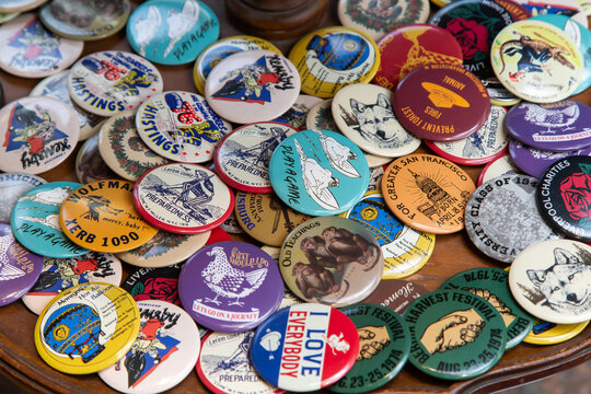 A  a collection of pin-back buttons, also known as pin buttons, button badges, or simply pins or badges